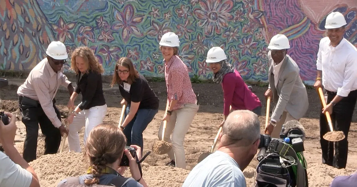 Becka Thompson breaking ground at North Commons Park with city leaders and community members, celebrating the $45 million park transformation.